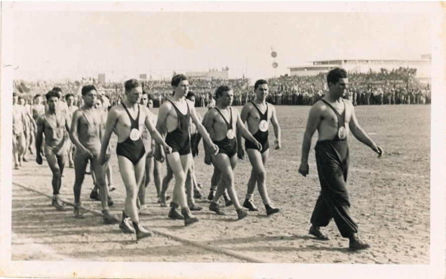 zalman leading wrestling team into stadium, 1930s