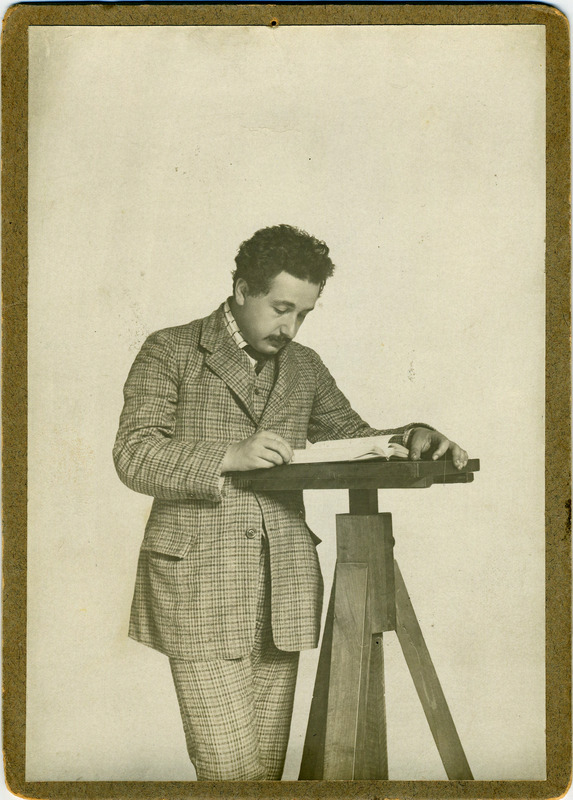 Albert Einstein reading at a podium at the Swiss patent office in Bern,  Switzerland - The Edythe Griffinger Portal